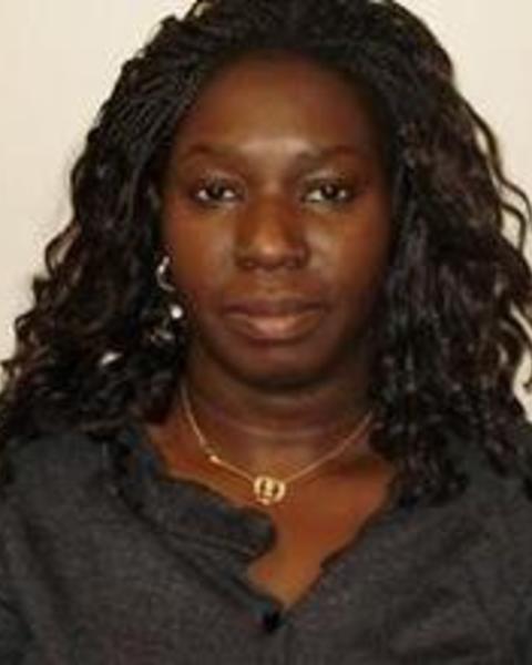 An image of Irene Ogolla from the neck up